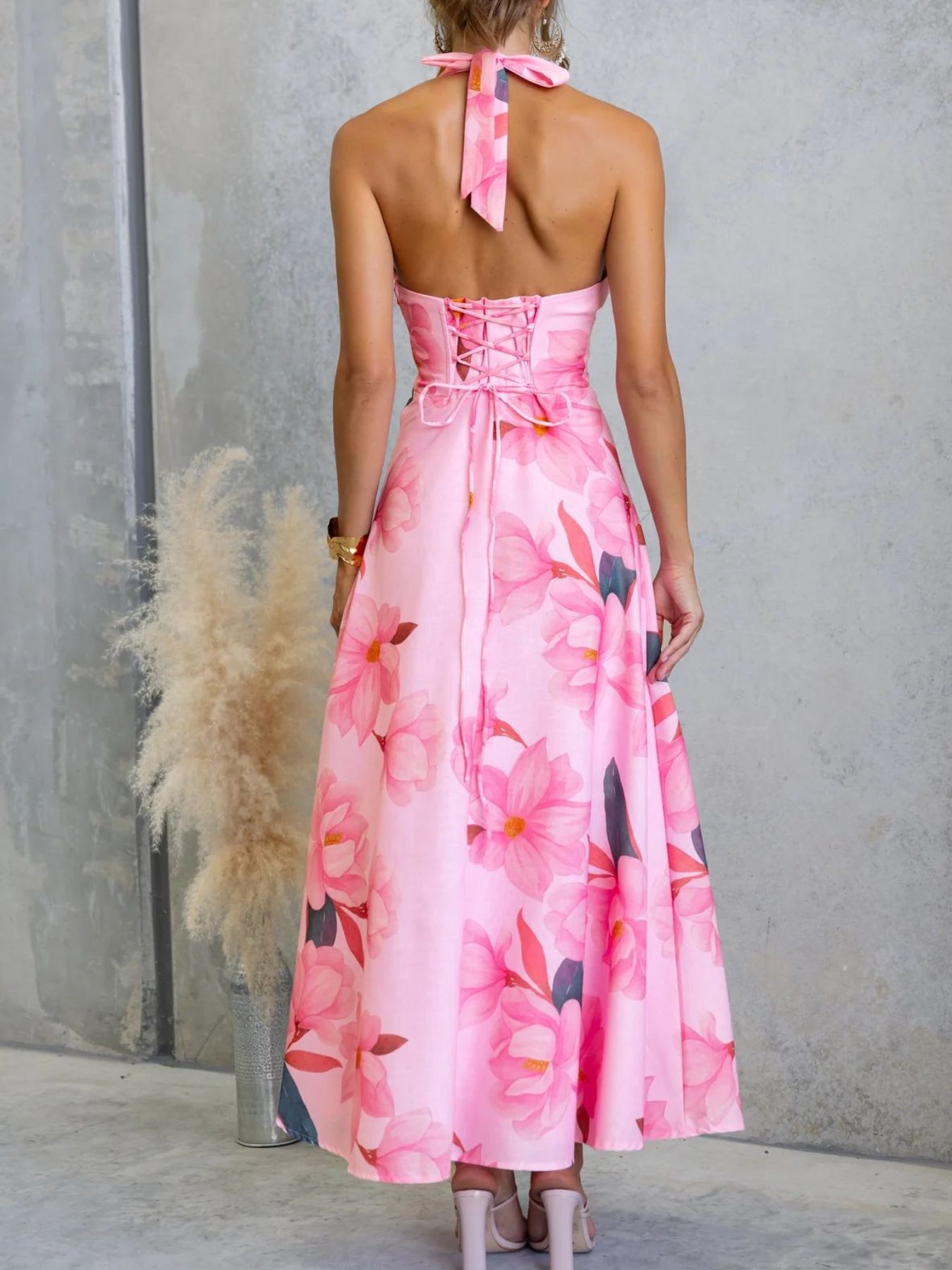 Pink floral halter neck maxi dress with corset back detail