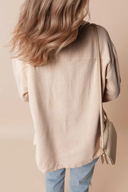 Beige textured corduroy oversized utility jacket with a casual fit.