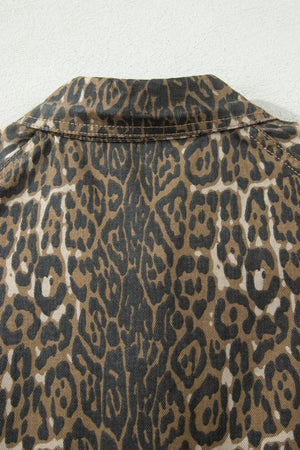 Denim dress with leopard print and puff sleeves, featuring a collar detail.