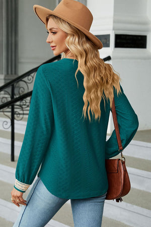 Deep Teal textured V-neck blouse with embroidered cuff detail