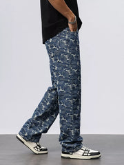 Relaxed fit blue cotton jeans with abstract camouflage pattern