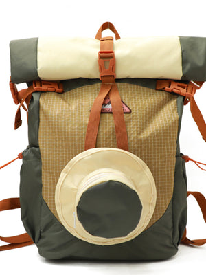 Sleek roll-top nylon backpack with tan grid pattern, olive green sides, and cream roll-top.
