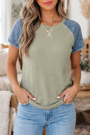 Color block waffle knit t-shirt with crew neck and cuffed sleeves in olive and blue.