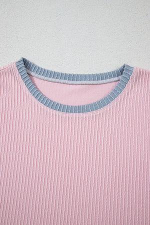 Ribbed blush pink loungewear top with a contrasting grey crewneck collar.