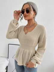 Ivory peplum knit sweater with scallop neckline and balloon sleeves