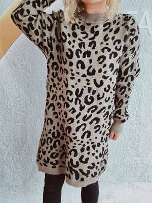 Leopard knit mini dress in caramel with long sleeves and mock neck.