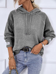 Charcoal textured knit raglan sleeve hoodie with drawstring hood and cuff detail.