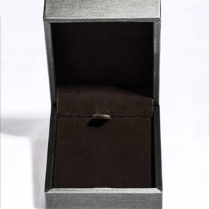 Silver textured ring box with dark brown velvet interior