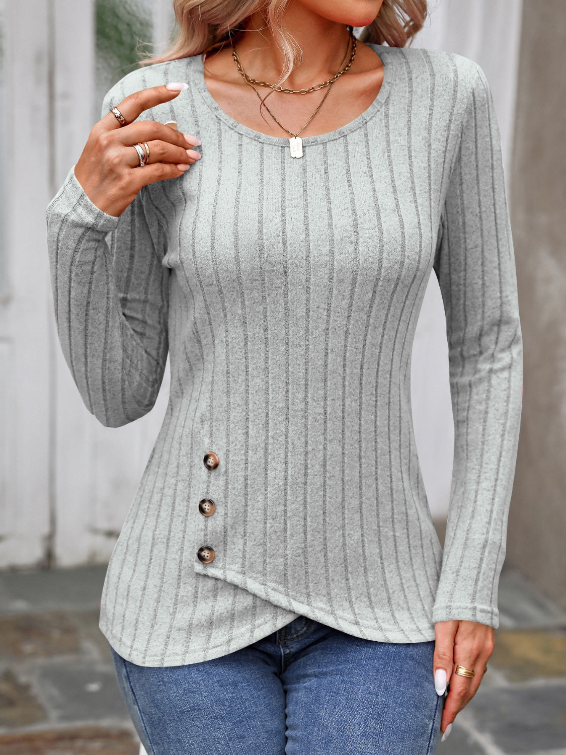 Gray ribbed long sleeve top with round neck and button detail