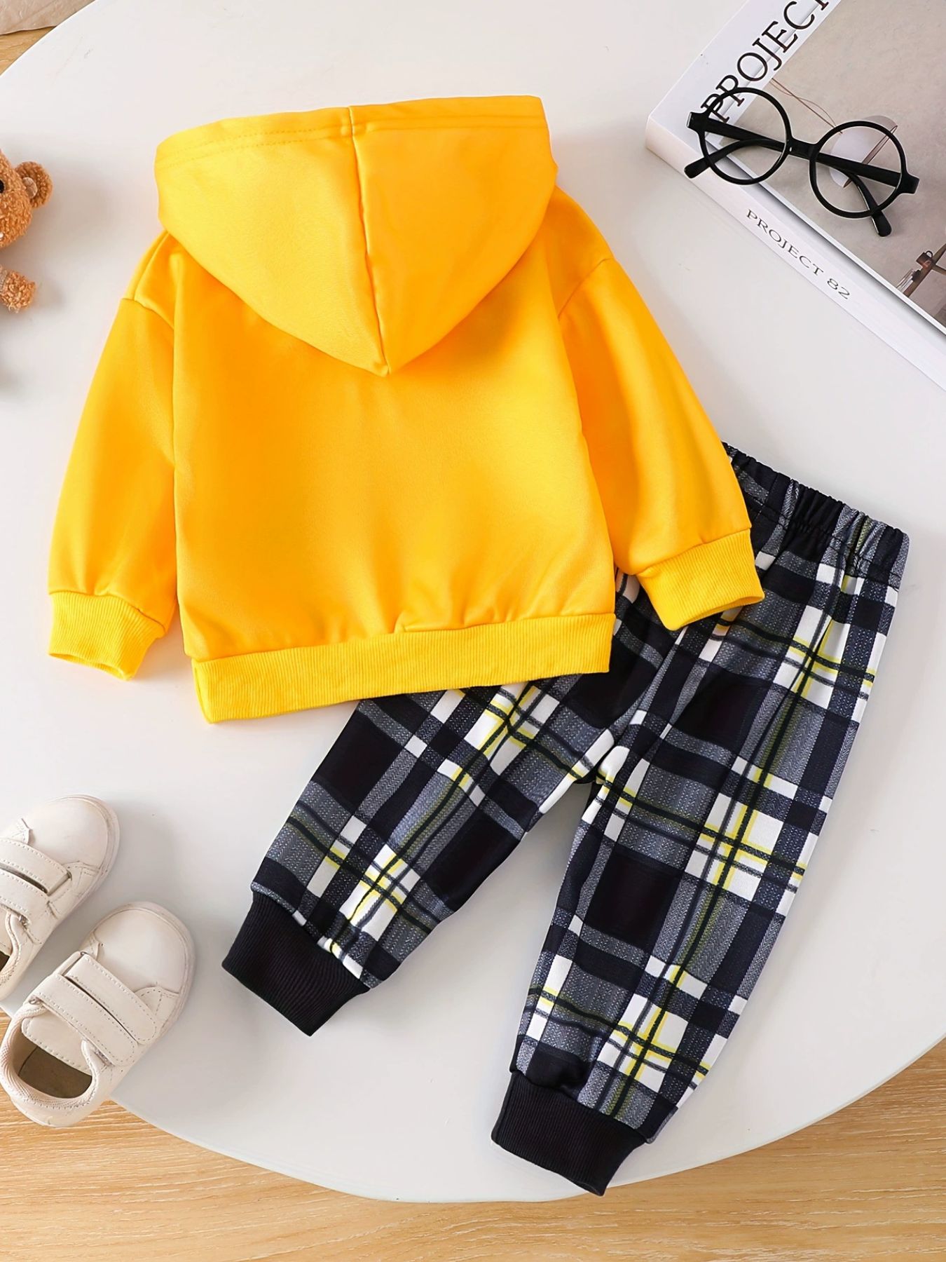 Baby yellow hoodie with plaid pants set.