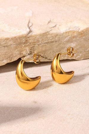 Gold sculpted crescent hoop earrings with post backs