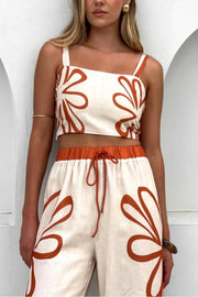 Floral print linen co-ord set with square neck crop top and drawstring waist pants in ochre.