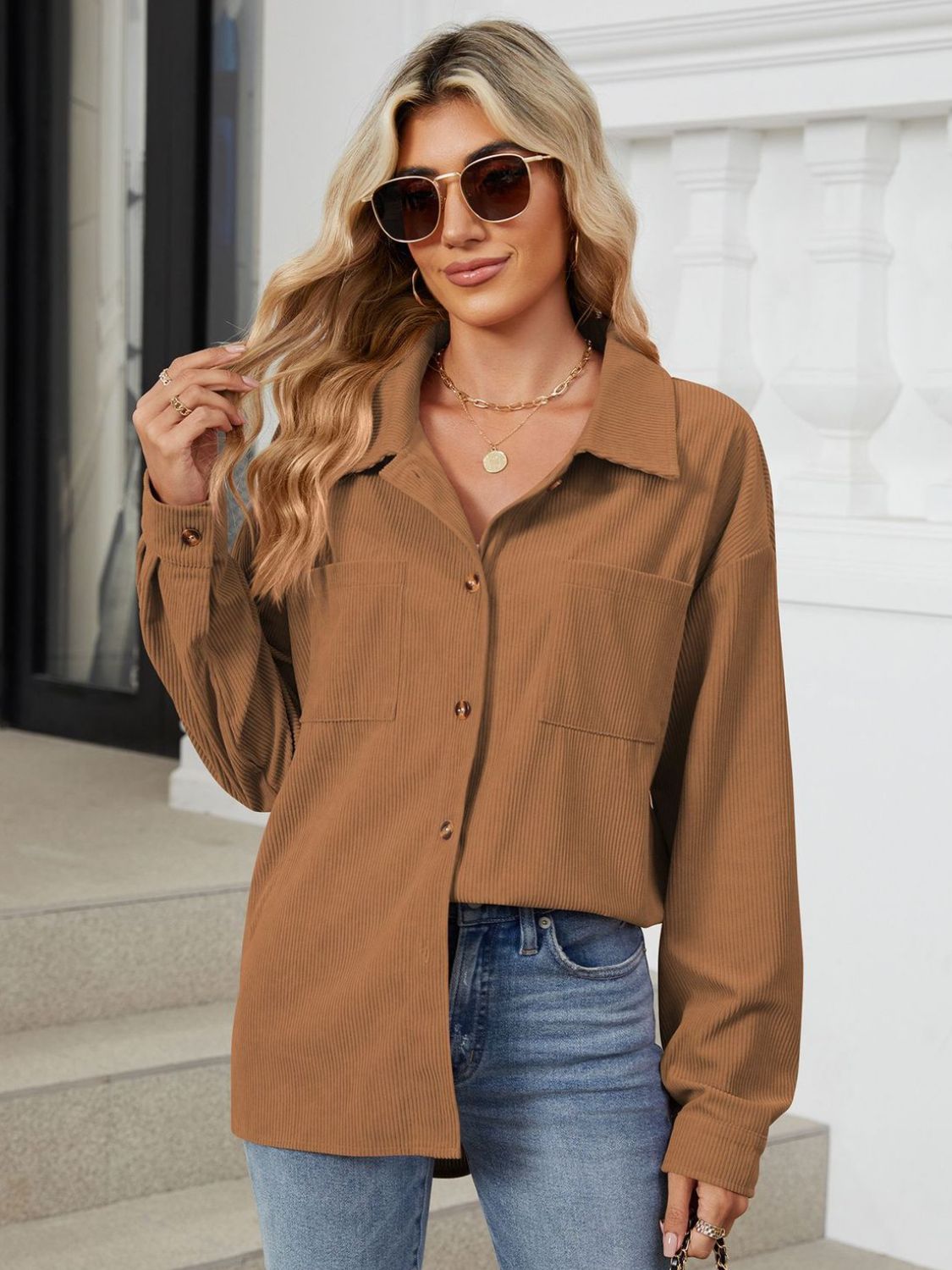 Caramel corduroy overshirt with button front and chest pockets.