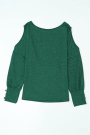 Dark green cold shoulder top with button cuffs and long sleeves