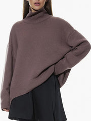 Mocha relaxed fit turtleneck sweater with sculptural sleeves and ribbed cuffs and hem.