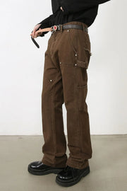 Brown carpenter pants with utility pockets and reinforced knees.