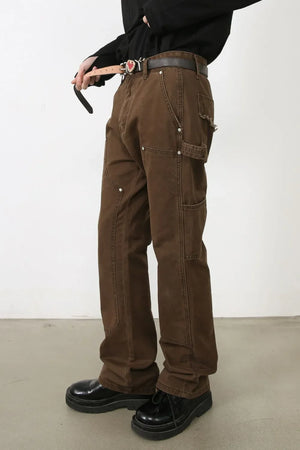 Brown carpenter pants with utility pockets and reinforced knees.
