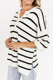 Button-down stripe knit pullover sweater with henley neckline and 3/4 sleeves.
