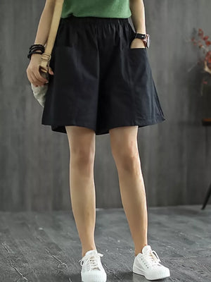 Black chino shorts with elastic waist and side pockets, casual women's shorts.
