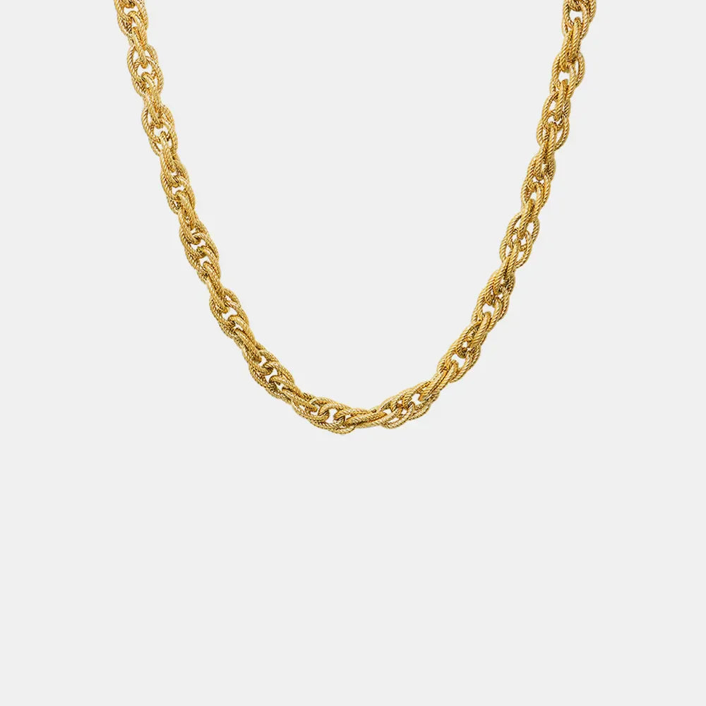 Gold textured rope chain necklace with intricate woven links.
