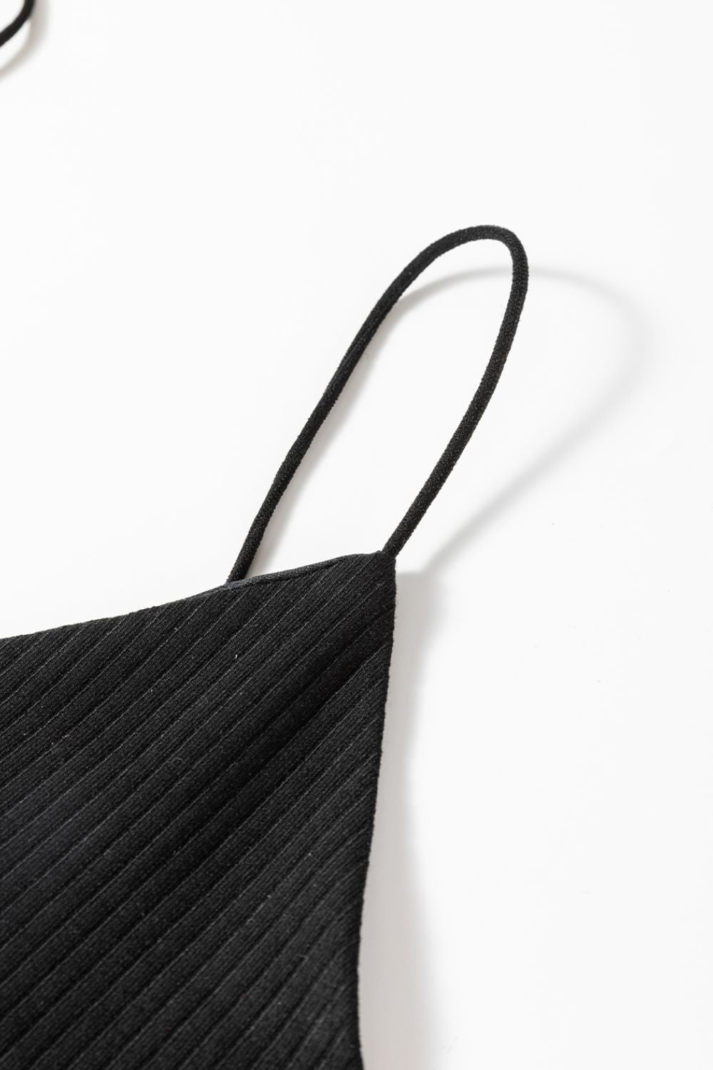 Black ribbed cami bodysuit with thin spaghetti straps