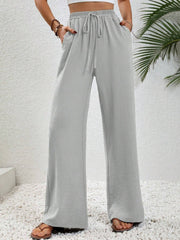 Light Gray textured palazzo trousers with drawstring waist and pockets