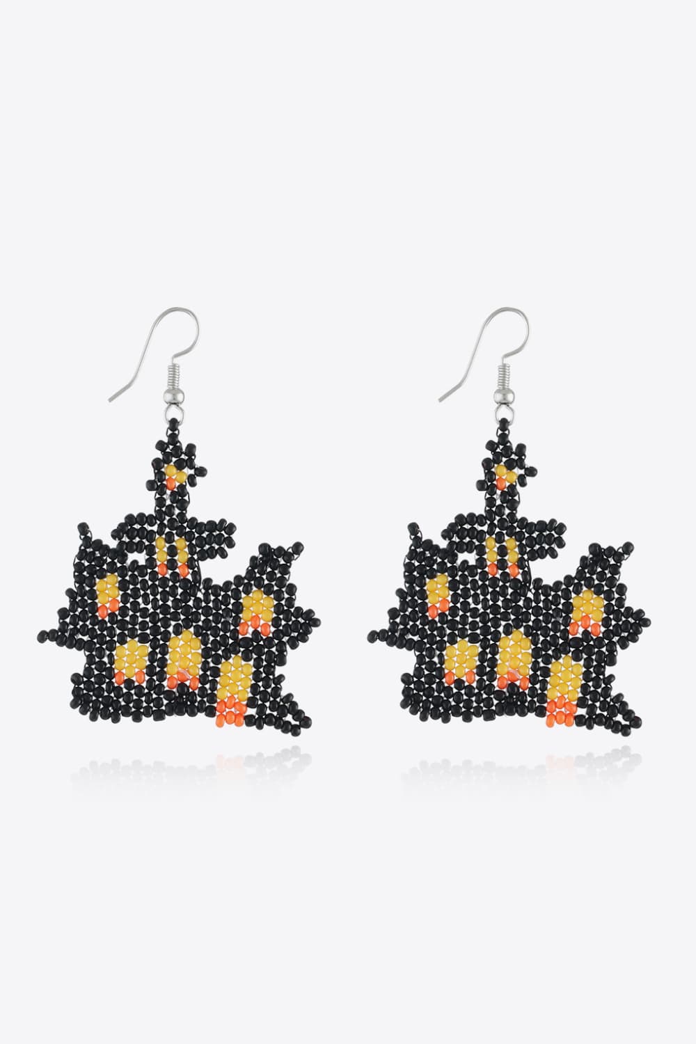 Beaded Castle earrings in black with orange and yellow accents.