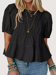 Black maternity blouse with puff sleeves, ruffled tiers, and ruched bodice.