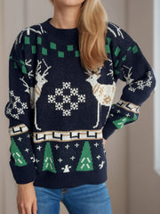 Indigo knit sweater with reindeer, snowflake, and Christmas tree motifs.