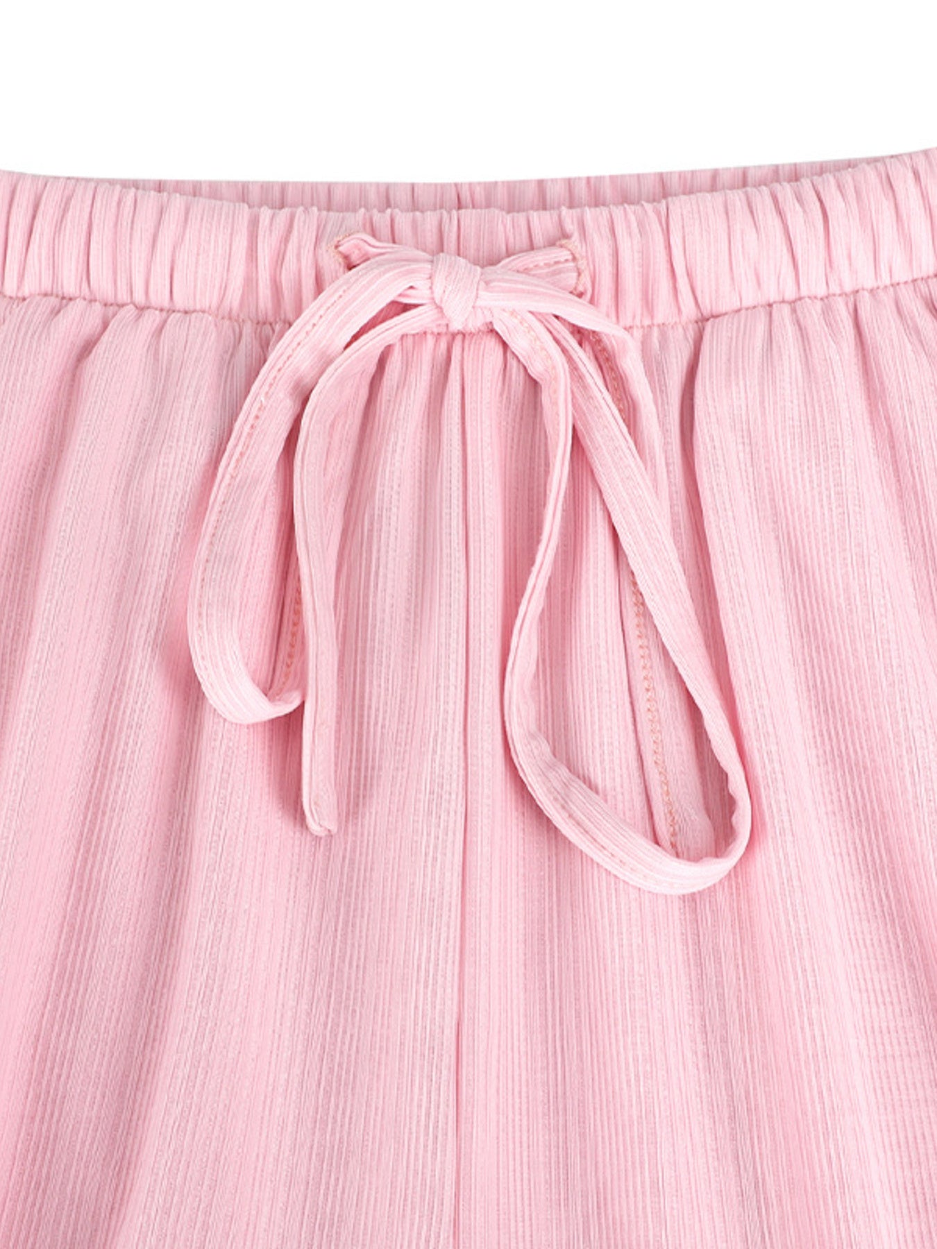 Pink crinkled wide leg pants with elastic waist and drawstring tie detail