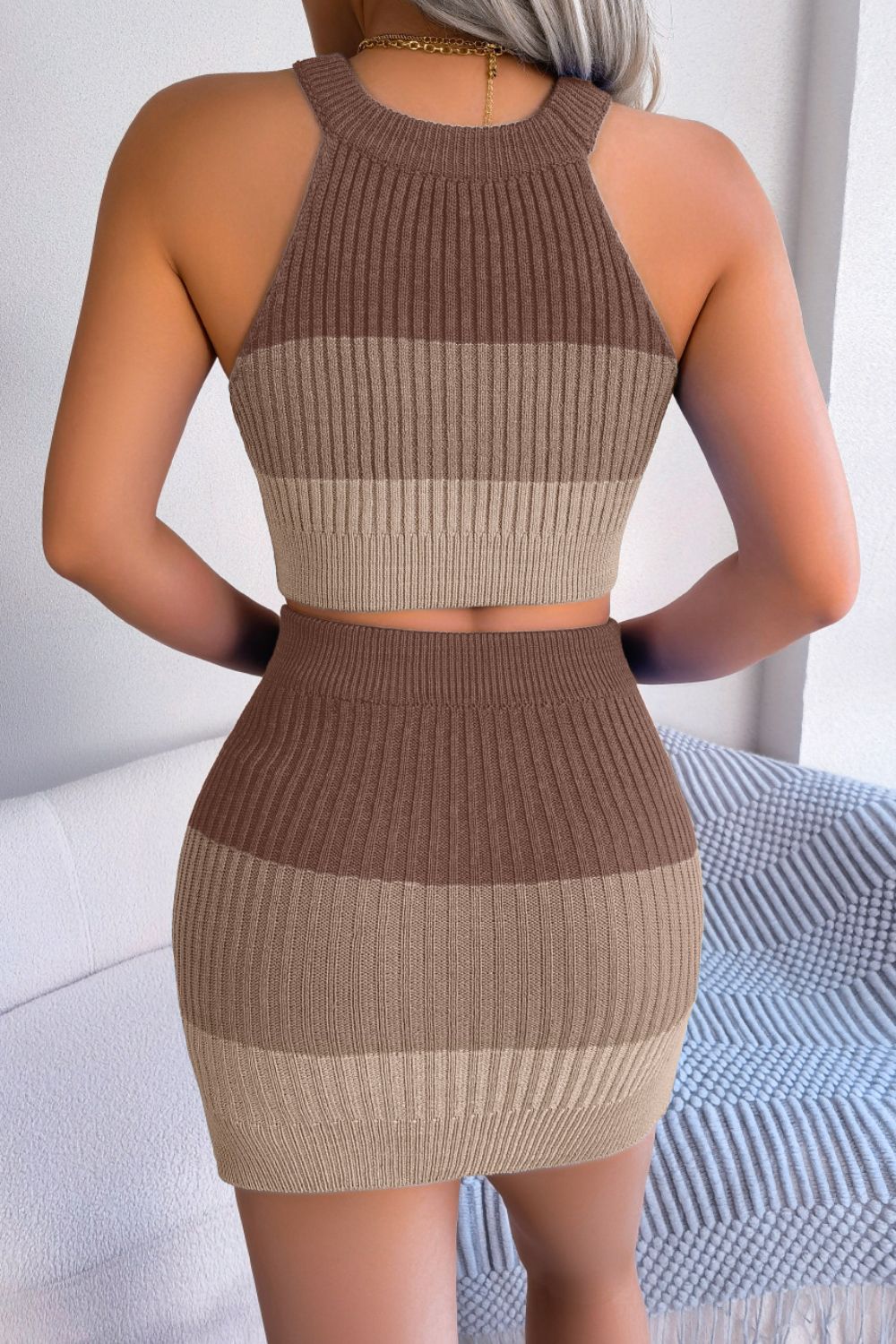 Ribbed halter crop top and mini skirt set in camel with horizontal stripes.