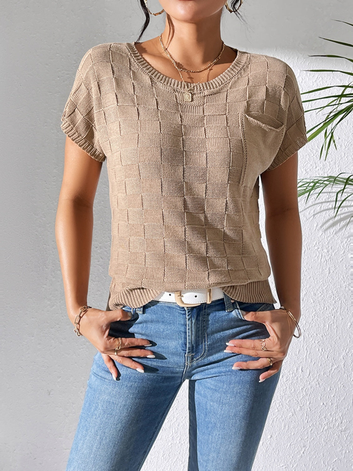 Camel knit pocket tee with textured check pattern and crew neck.