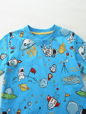 Blue cotton baby t-shirt with playful astronaut and space graphics.