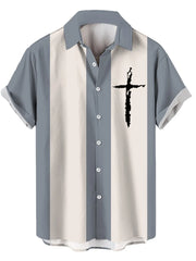 Casual button-up shirt with vertical stripes and a black cross graphic.