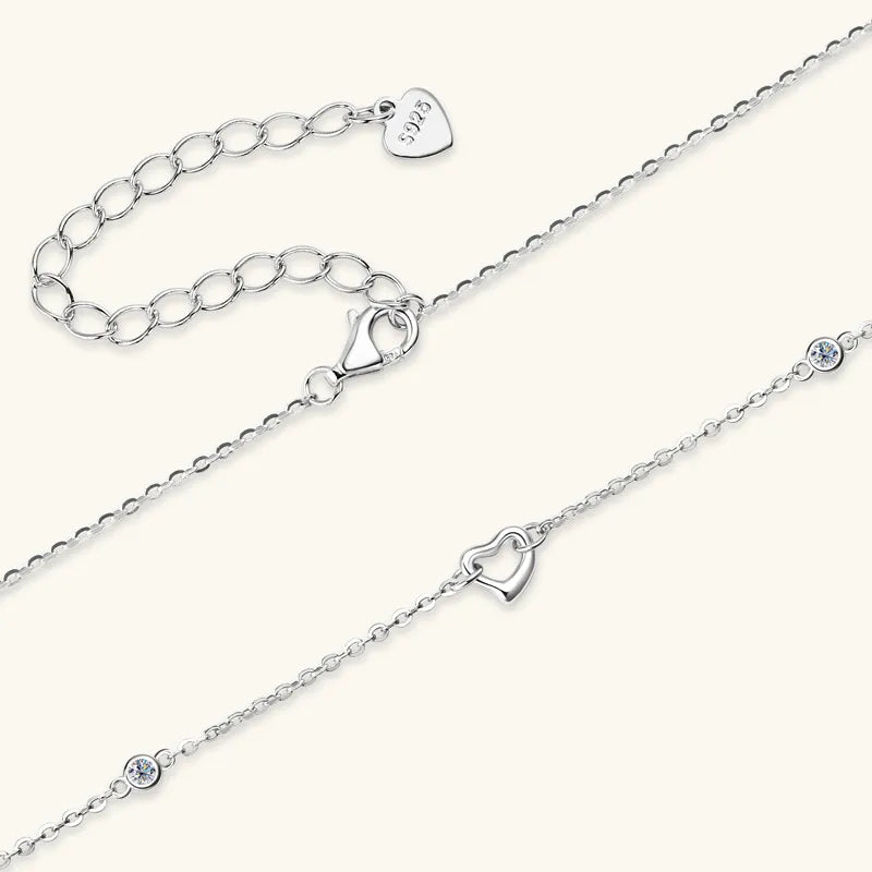 Silver linked heart pendant necklace with accent stones and 5925 charm.