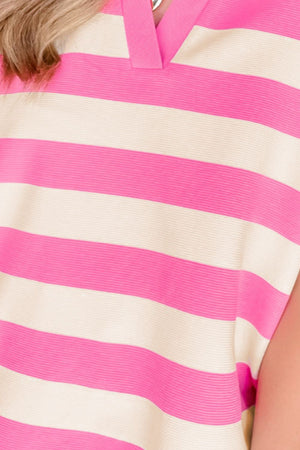 Pink and cream striped V-neck tee with a collar detail.