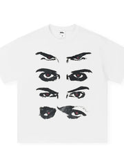 White cotton t-shirt with a bold black eye graphic and red accents.