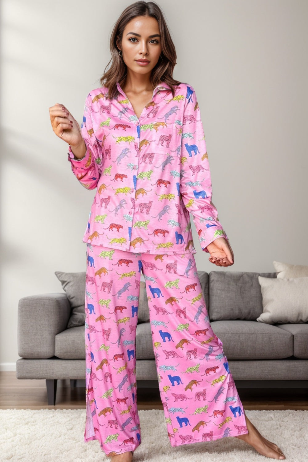 Pink leopard print pajama set with long sleeves and wide-leg pants.