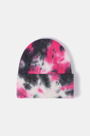 Ribbed knit beanie with black and magenta tie-dye pattern