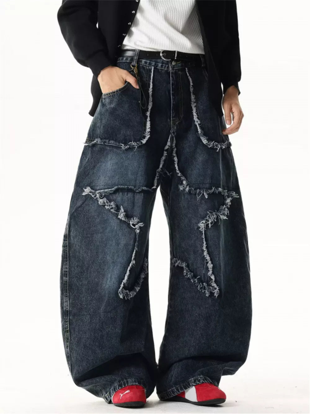 Star Patchwork Distressed Wide Leg Jeans in dark wash cotton with frayed details.