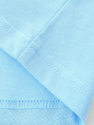 Light blue cotton t-shirt detail showing seams and hem.