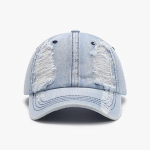 Light denim baseball cap with shredded details and distressed accents.