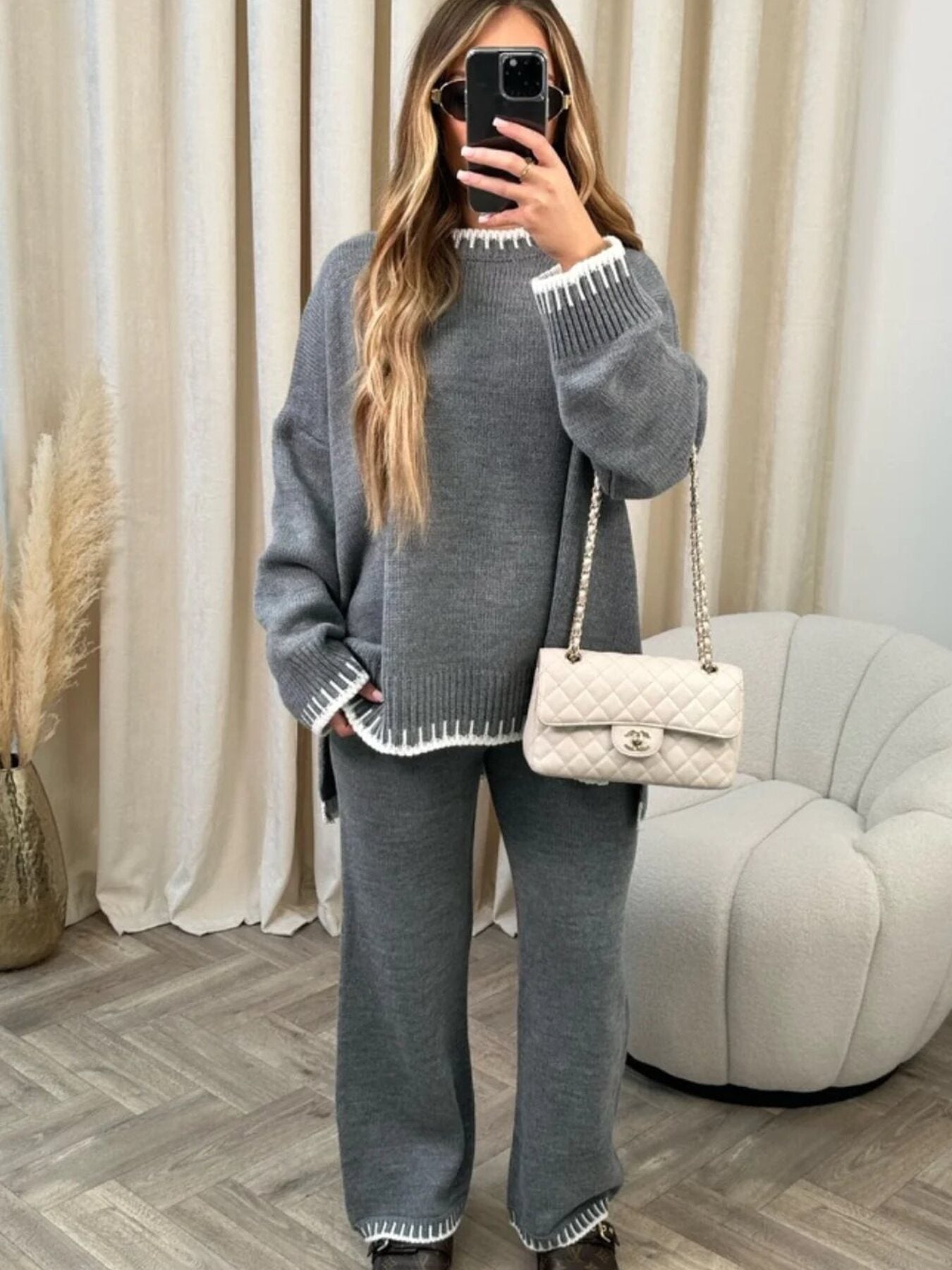 Gray relaxed fit sweater set with contrast trim on neckline, cuffs, and hem.