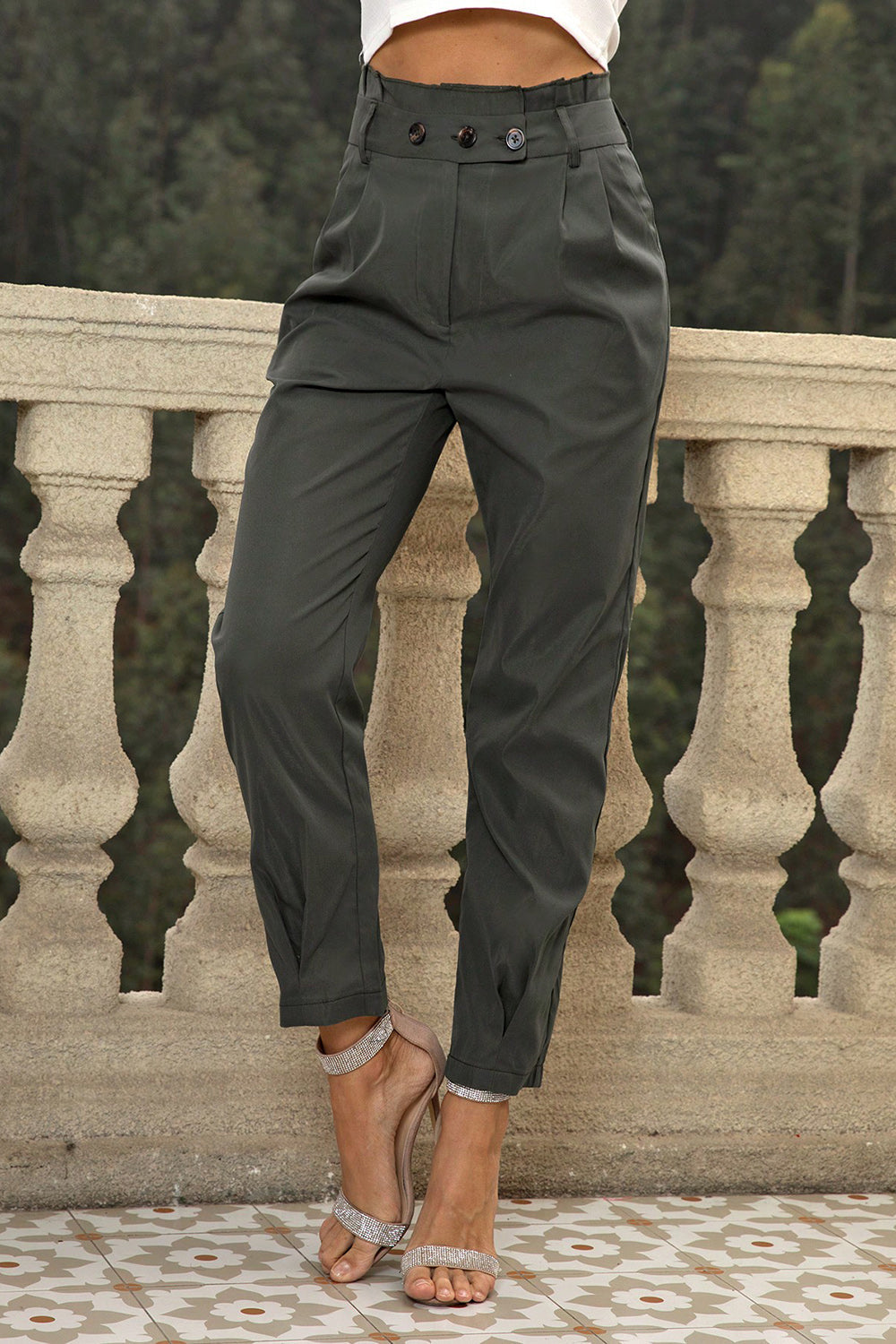 Gathered waistline tapered trousers in matcha green with button detail and cropped length.