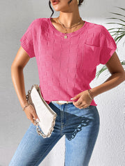 Textured knit pocket tee in bright pink with short sleeves and crew neck.