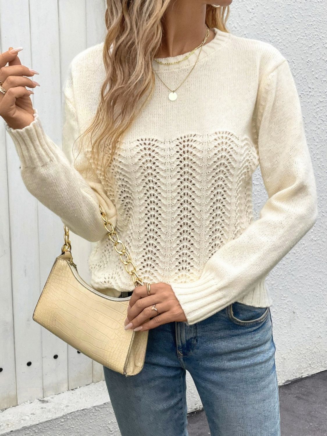 Cream crewneck sweater with lace inset detail and long sleeves