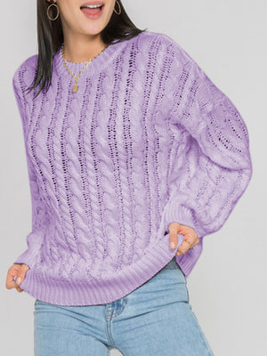 Lavender cable knit openwork sweater with crewneck and long sleeves.