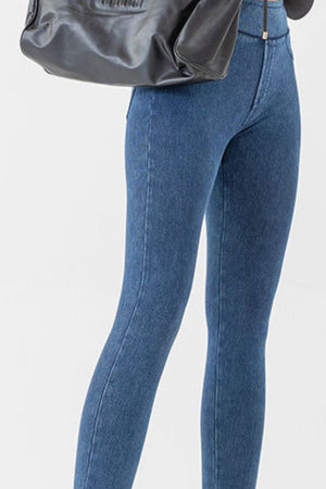 Sculpted denim-effect leggings in medium blue with a high waist and front seam detail.