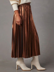 Metallic bronze accordion pleat midi skirt with a shimmering finish.