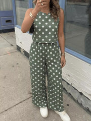 Green polka dot crop top and wide-leg pants set with a round neckline and sleeveless design.